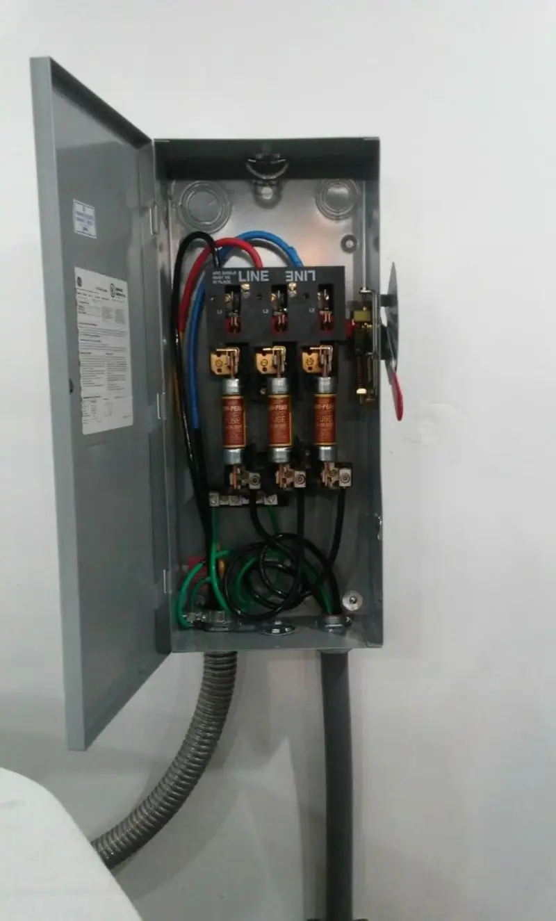 Three-phase disconnect switch installed for Smoke Detector Installation in Larned